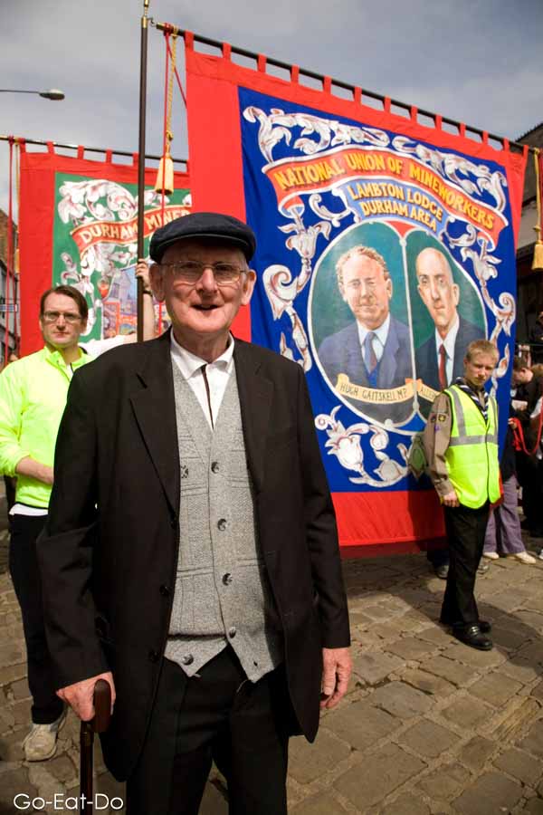 A man by the Lambton Lodge banner during the Durham Miners' Gala.