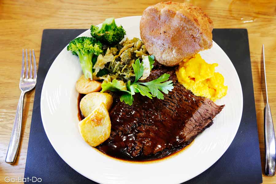 Traditional British Sunday lunch featuring roast beef and Yorkshire pudding served at the Riverview Brasserie in Sunderland's Stadium of Light