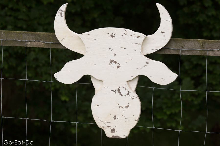 Cattle symbol on the gate of the wild cattle enclosure at Chillingham Castle in Northumberland