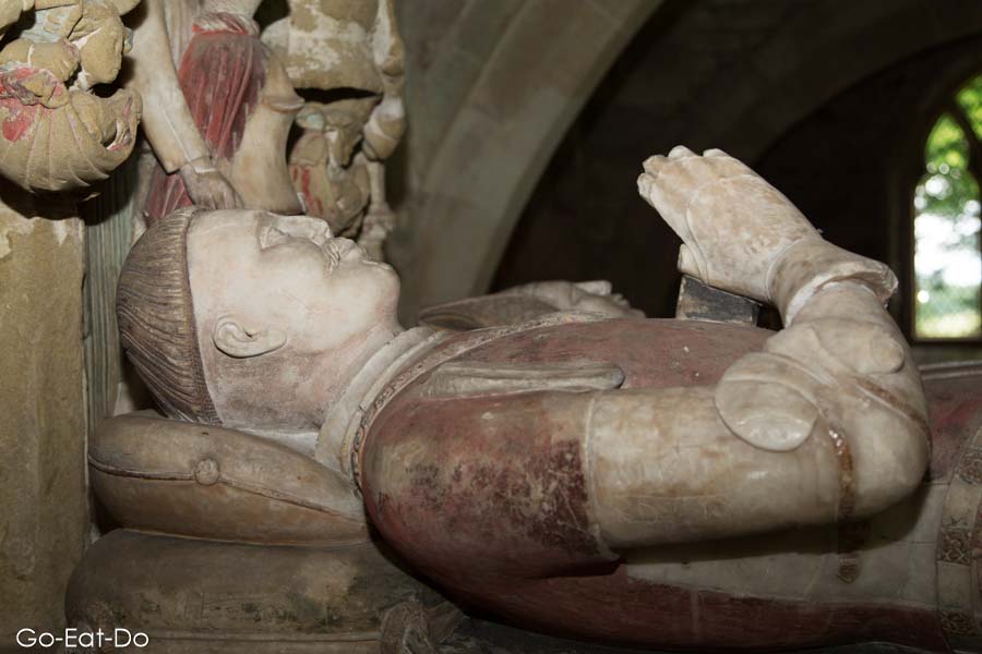 Effigy of medieval knight Sir Ralph Grey in his tomb at St Peter's Church in Chillingham, Northumberland