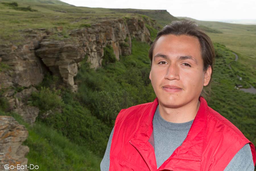 William by the cliffs from which bison fell in bygone times at Head-Smashed-In Buffalo Jump in Alberta, Canada, 