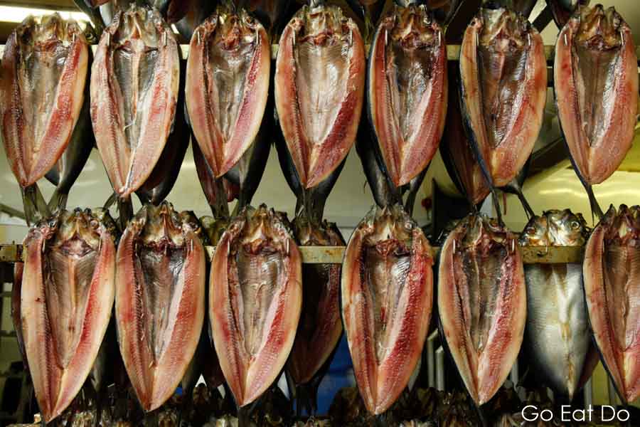 Herrings hanging on tenterhooks ahead of being smoked in L Robsons and Sons kiln at Craster, Northumberland, to make Craster Kippers.