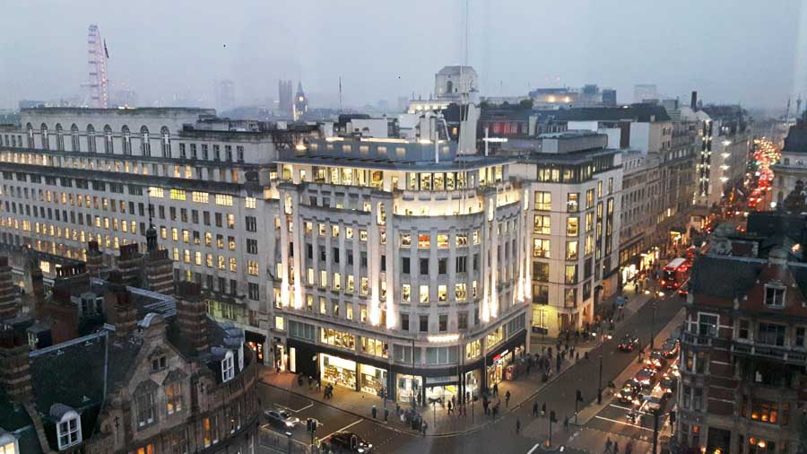 A view from the penthouse suite at the ME London Hotel. The London eye is peeking up above the buildings of The Strand.
