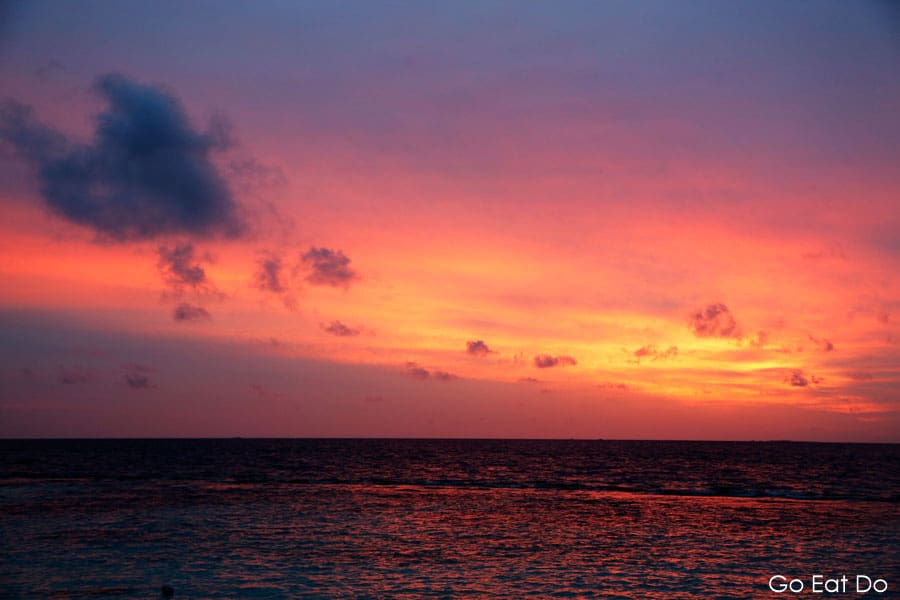 A beautiful sunset over the Indian Ocean seen from Bandos Island in the Maldives