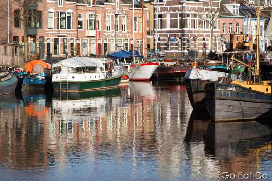 Boats docked in the Winschoterdiep in Groningen.