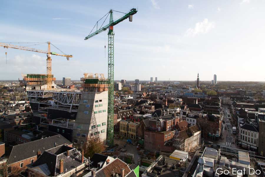 Cranes busy in construction in central Groningen, the Netherlands