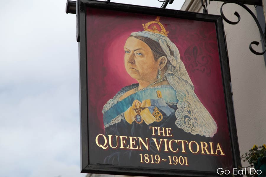 The Queen Victoria pub sign in Windsor, Royal Berkshire, England