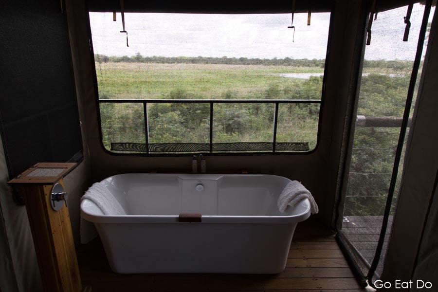 Bathtub with a view at Elephant Eye Safari Camp by Hwange National Park, Zimbabwe
