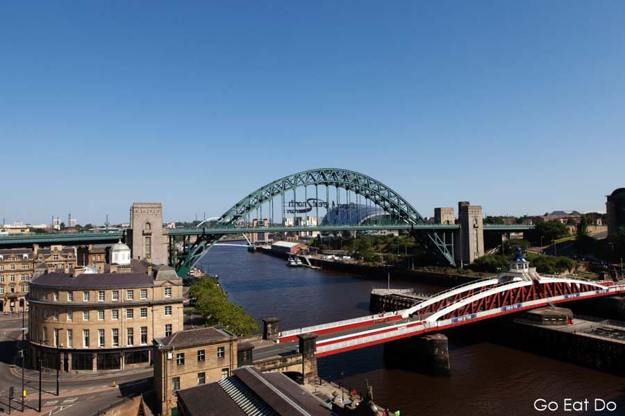 Swing Bridge and Tyne Bridge over River Tyne on a sunny blue sky day in NewcastleGateshead, northeast England