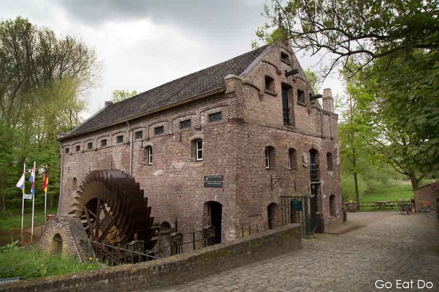 Restored watermill at Arcen in the Netherlands housing De Ijsvogel Distillery where spirits including asparagus liqueur and Dutch whisky are distilled.