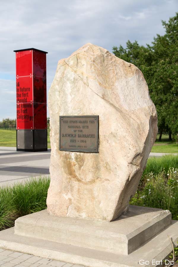 Memorial stone and plaque at the site of Fort Calgary in Calgary, Alberta, Canada