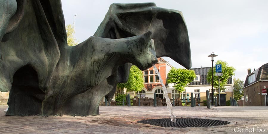 Water gushed from the mouth of artist Johan Creten's De Vleermuis (The Bat) fountain at Bolsward in the Netherlands, one of Friesland's 11 Fountains