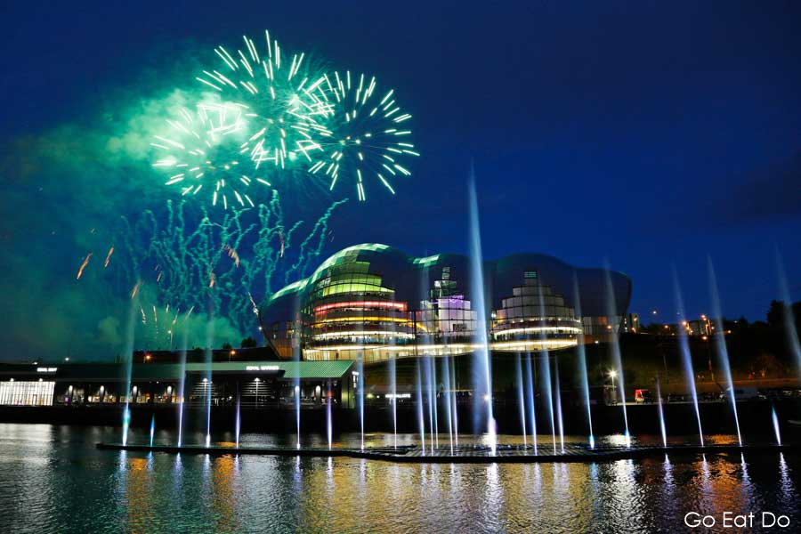Fireworks display and fountain by Sage Gateshead during the Great Exhibition of the North opening ceremony seen from Newcastle Quayside