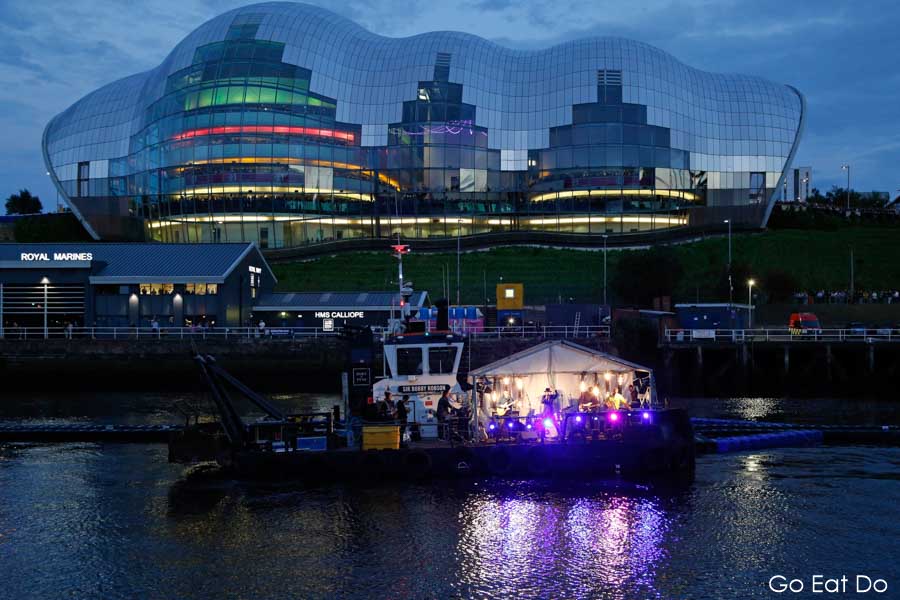 Maximo Park playing during the opening ceremony of the Great Exhibition of the North below the Sage Gateshead on the River Tyne between Newcastle and Gateshead