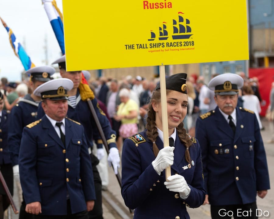 The crew of Mir, a Russian sailing ship, during a parade during the 2018 Tall Ships Race in Sunderland, England