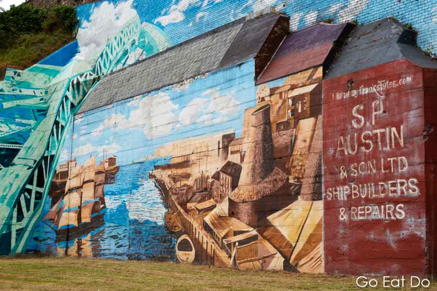 A mural depicting shipbuilding in Sunderland. It stands by the bank of the River Wear.