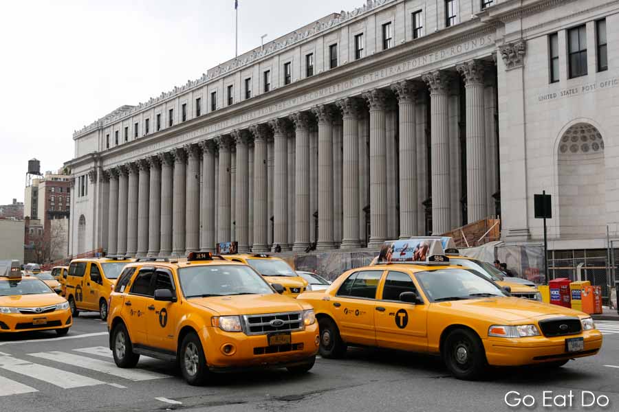 Yellow taxi cabs on 8th Avenue in New York City, USA