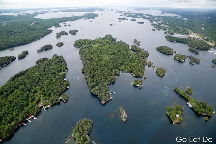 Aerial view of the St Lawrence River and verdant isles of the Thousand Islands seen during a tour operated by 1000 Islands Helicopter Tours