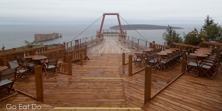 Misty day at the suspended glass platform in the Geoparc de Percé, UNESCO Global Geopark in Perce, Quebec.