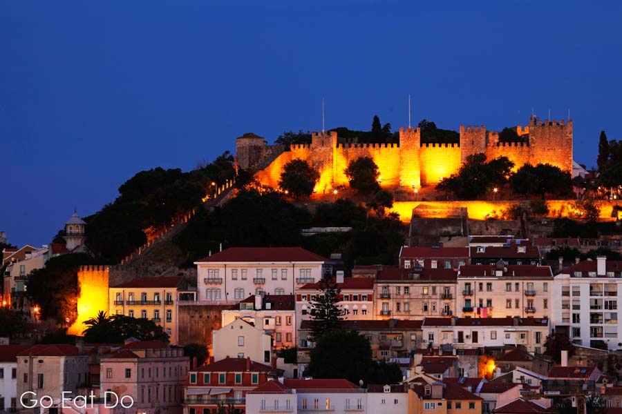 Castle of St George, Castelo Sao Jorge, illuminated at night in Lisbon, Portugal