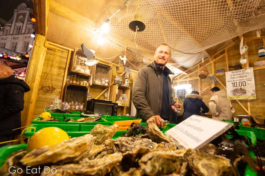 Julian Petit at the Thierry Petit oyster stall at Arras Christmas market.