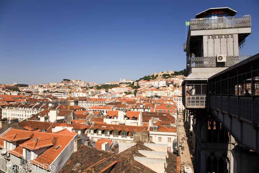Tiled roofs of the Baixa District and Castle of St George, Castelo Sao Jorge, under the Elevador Santa Justa in Lisbon, Portugal