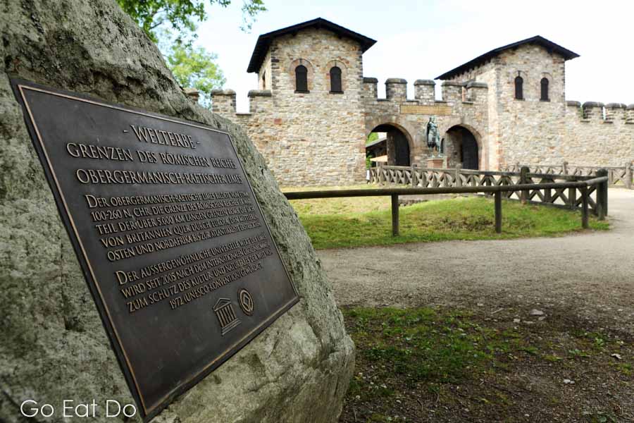 Sign proclaiming the UNESCO World Heritage Site status of the Roman frontiers at Saalburg Roman Fort near Bad Homburg, Hesse, Germany