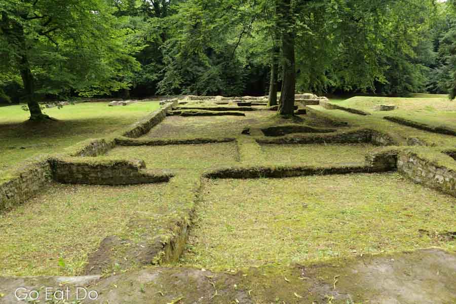 Outlines ruins of ancient buildings at Saalburg Roman Fort near Bad Homburg, Hesse, Germany