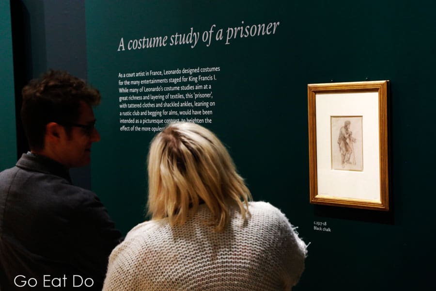 People viewing a costume study by Leonardo da Vinci in Sunderland Museum and Winter Gardens as part of the 'Leonardo da Vinci: A Life in Drawing' exhibition.