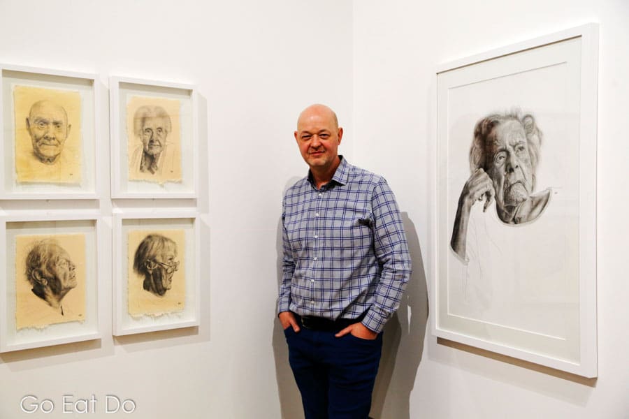Artist Andrew Tift by his series of portraits, 'One Day You’ll Be Older Too', an exhibition displayed at Sunderland Museum and Winter Gardens.
