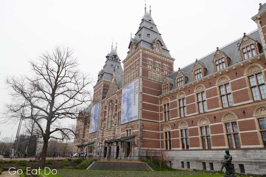 Facade of the Rijksmuseum with posters advertising the 'All the Rembrandts' exhibition, in Amsterdam, the Netherlands