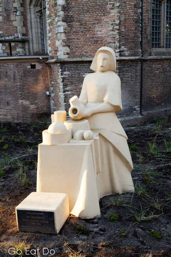 Sculpture by Wim T Schippers of Vermeer's The Milkmaid painting in Delft, the Netherlands