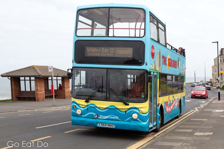 Seasider double-decker bus on the coast road at Tynemouth on its route from North Shields to Whitley Bay