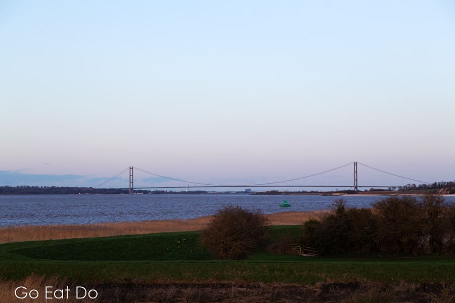 Humber Bridge spanning the River Humber, seen from The Hope and Anchor pub at South Ferriby, Lincolnshire