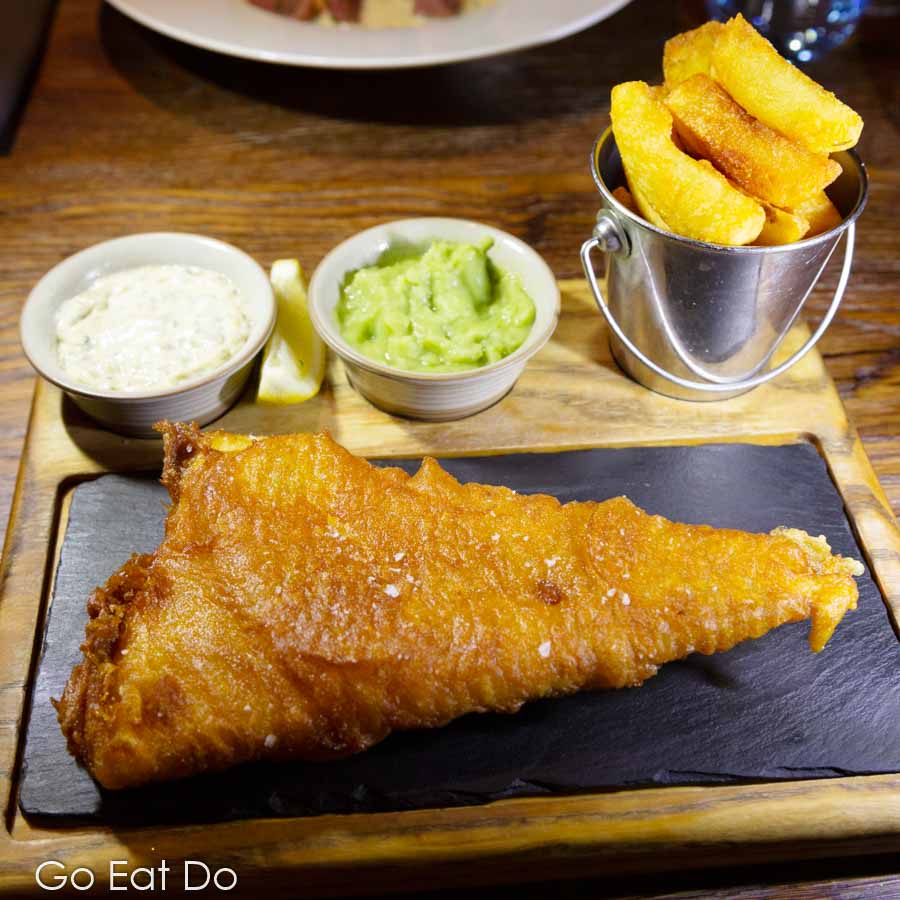 Fish and chips served with tartar sauce and mushy peas at the Hope and Anchor South Ferriby gastropub in north Lincolnshire.