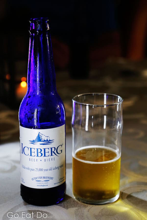 Bottle and glass of Iceberg beer, brewed with water harvested from icebergs, served in Newfoundland and Labrador, Canada