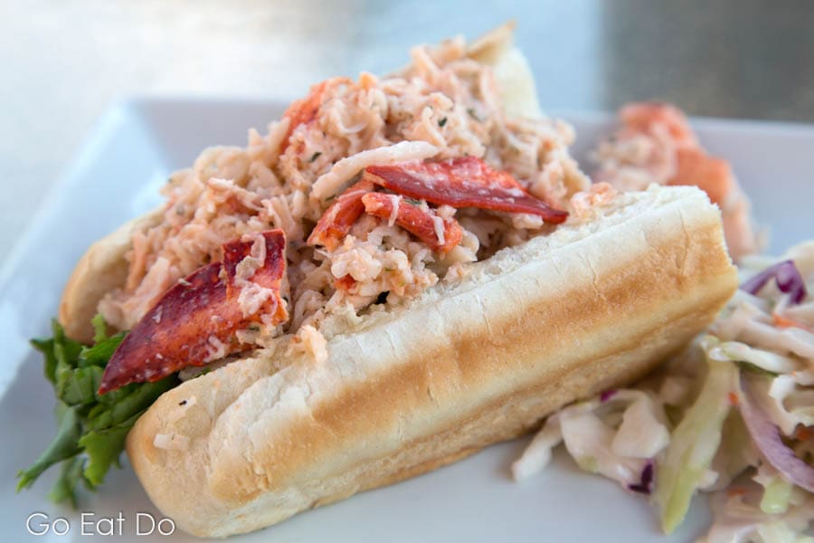 Lobster roll, with dressed meat served in a brioche roll, with a coleslaw side served in Saint John, New Brunswick, Canada