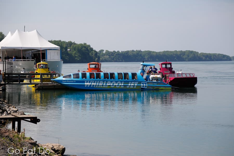 Boat docked at the Whirlpool Jet Boat Tours jetty at on the Niagara River at Queenston Boat Ramp in Ontario, Canada
