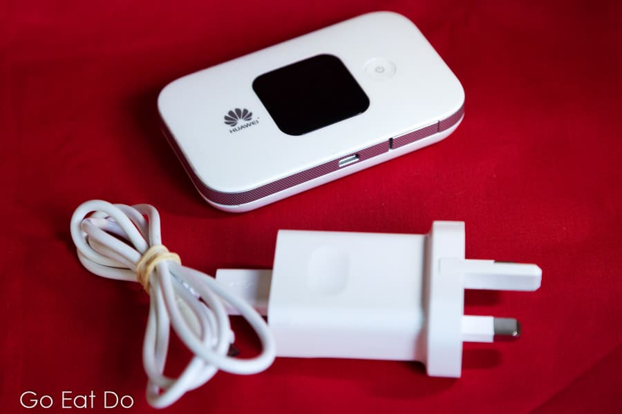 Huawei MiFi, supplied by Cellhire, and charging cable