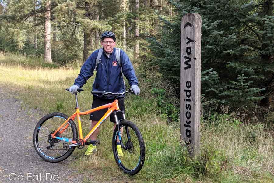 Travel blogger Stuart Forster cycling the Lakeside Way in Northumberland, England