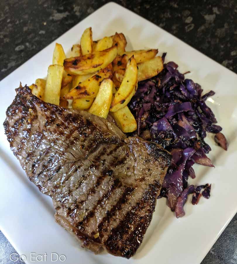 Steak, chips and grilled cabbage. I served this with a peppercorn sauce.