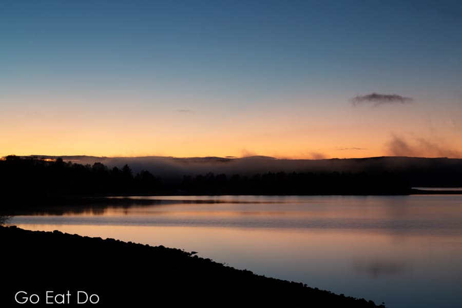 Dusk on a clear evening at Kielder Water in Northumberland, England.