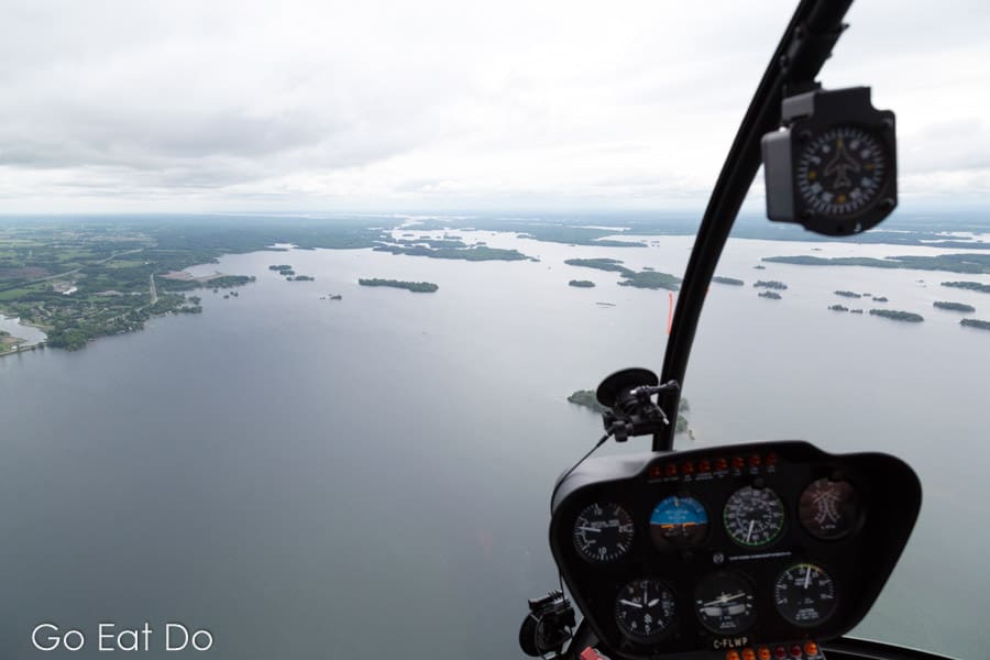 View from the cockpit of the R44 Raven operated by 1000 Islands Helicopter Tours.