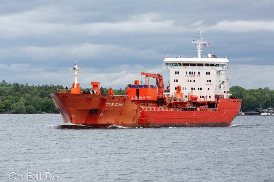 A ship on the Saint Lawrence Seaway, an international shipping land, in the Thousand Islands region, on the border of the USA and Canada.