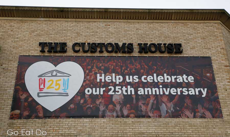 'Help us celebrate our 25th anniversary' sign at the Customs House theatre at South Shields in Tyne and Wear, England