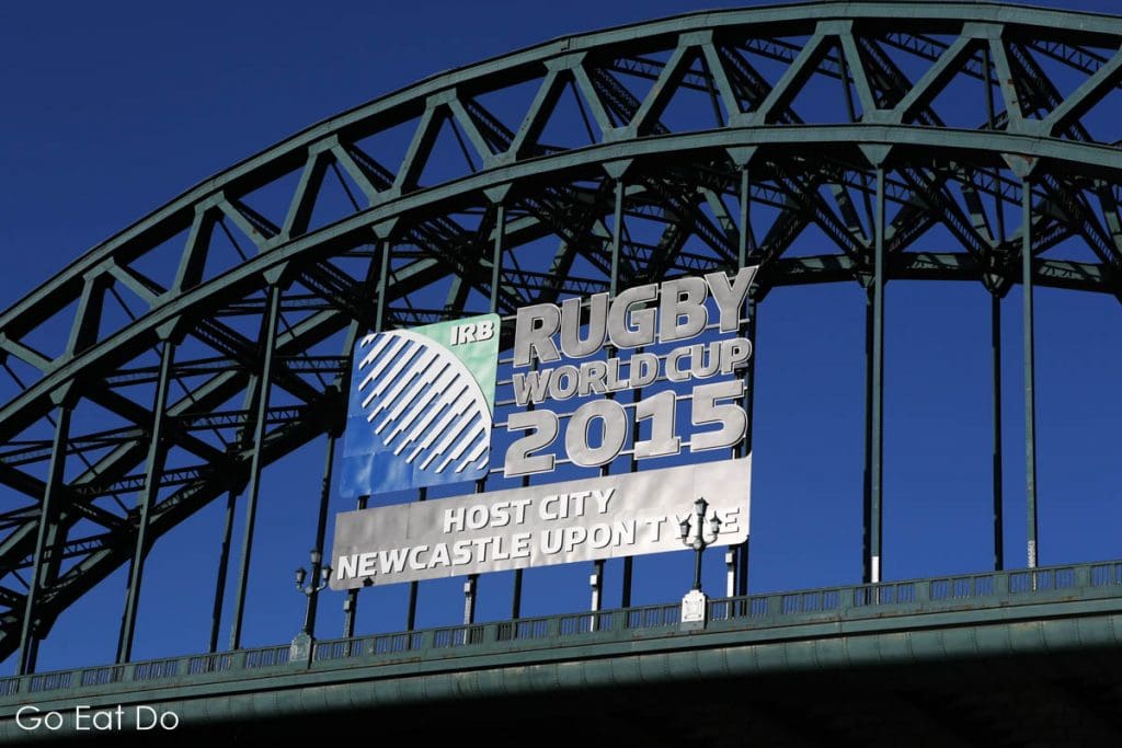 Sign on the Tyne Bridge stating that Newcastle upon Tyne is a Rugby World Cup 2015 host city