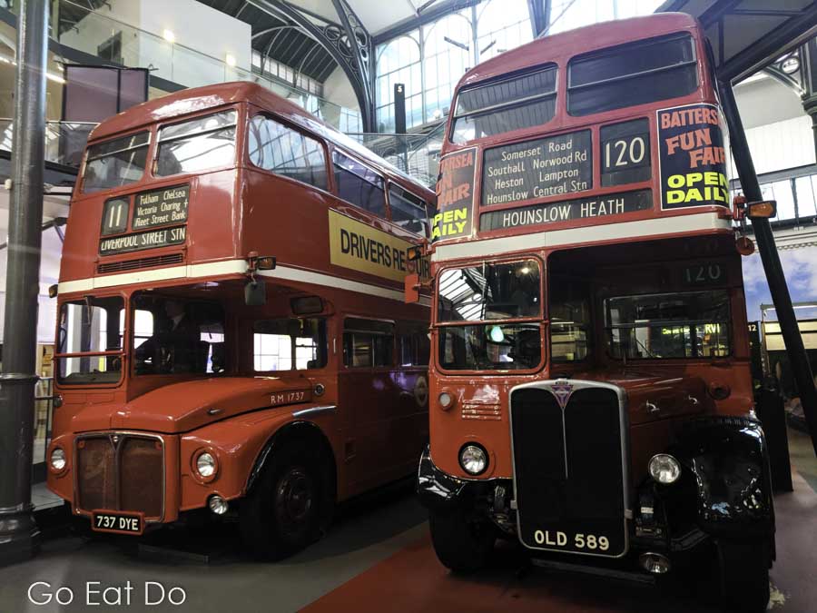Red double-decker buses at London Transport Museum.
