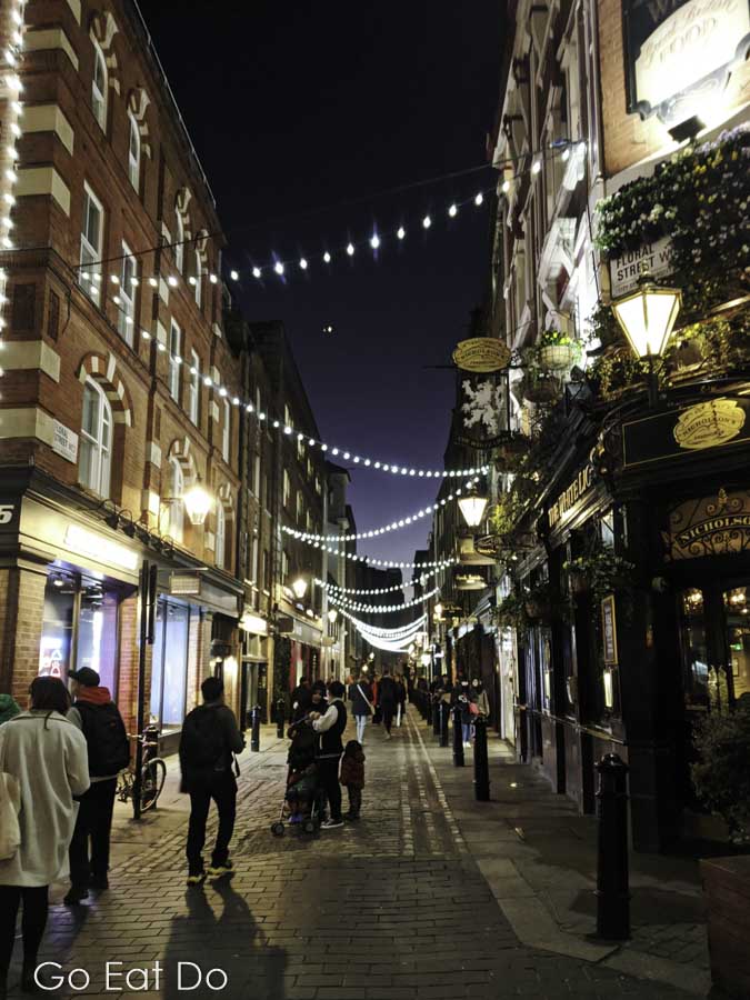 Illuminations in Floral Street, London, by Covent Garden's White Lion pub.