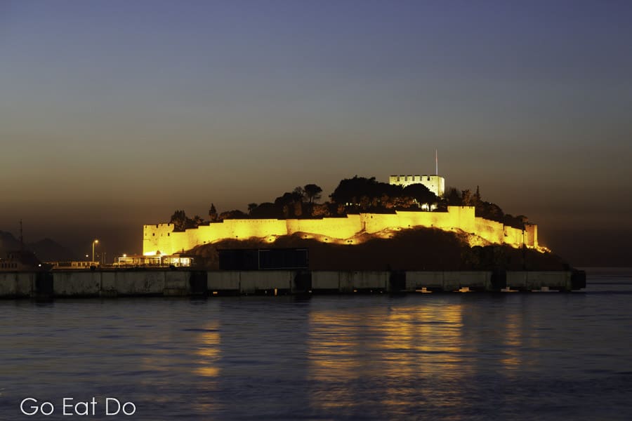 Kusadasi Castle, illuminated at night, on the coast of Turkey.