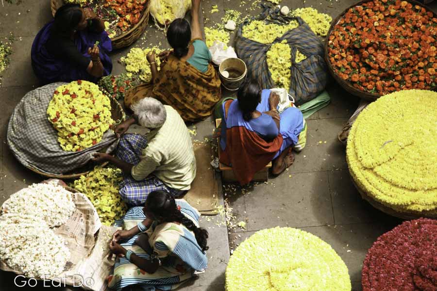 Flower sellers at City Market in Bengaluru, formerly known as Bangalore, in India